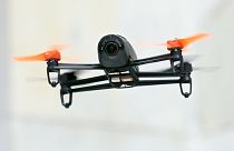FILE: FILE - In this May 8, 2014 file photo, a Parrot Bebop drone flies during a demonstration event in San Francisco.