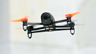 FILE: FILE - In this May 8, 2014 file photo, a Parrot Bebop drone flies during a demonstration event in San Francisco. 