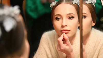 Ballerina Viktoria Solovyeva prepares for her performance backstage at Odesa's Opera and Ballet Theatre