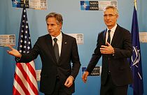 US Secretary of State Antony Blinken gestures with NATO Secretary-General Jens Stoltenberg in Bucharest, Romania.