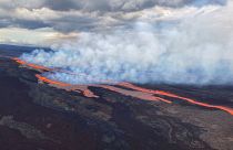 In this aerial photo released by the U.S. Geological Survey, the Mauna Loa volcano is seen erupting from vents on the Northeast Rift Zone on the Big Island of Hawaii, Monday.