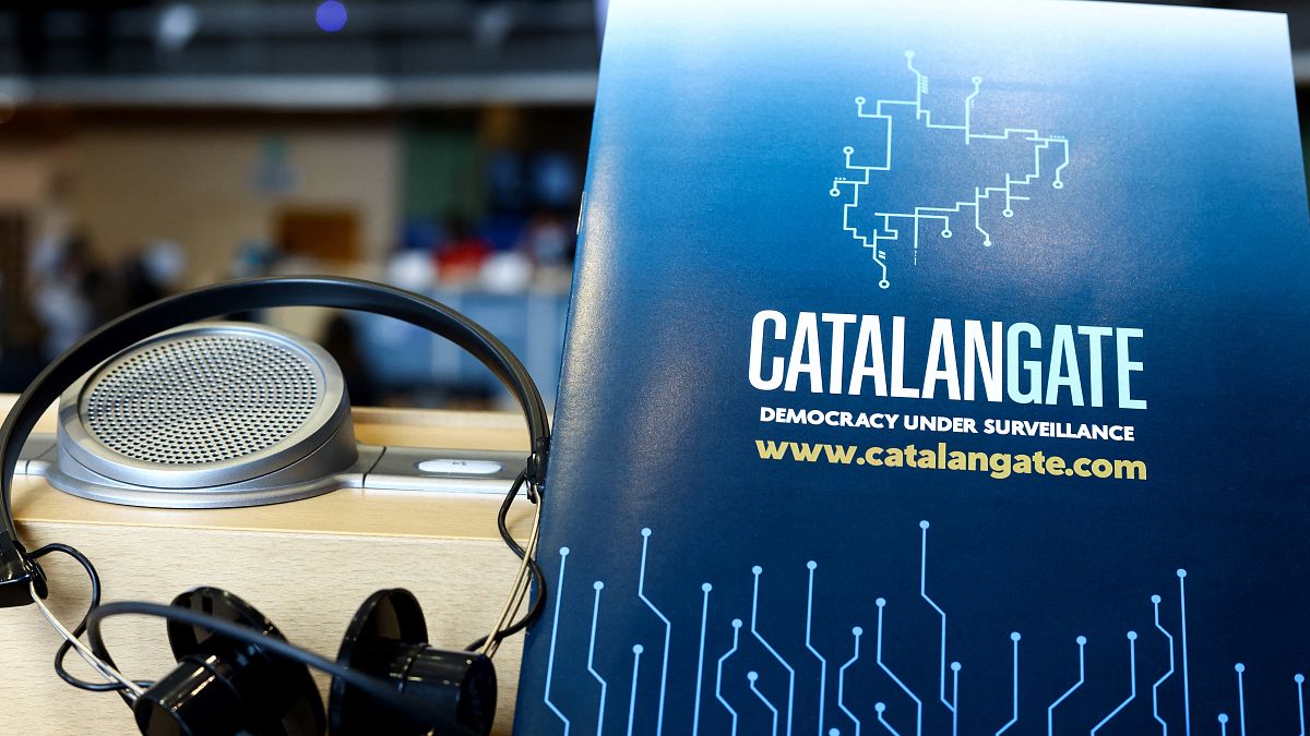 This picture taken on April 19, 2022 at the EU Parliament in Brussels shows a document entitled, "Catalangate democracy under surveillance".