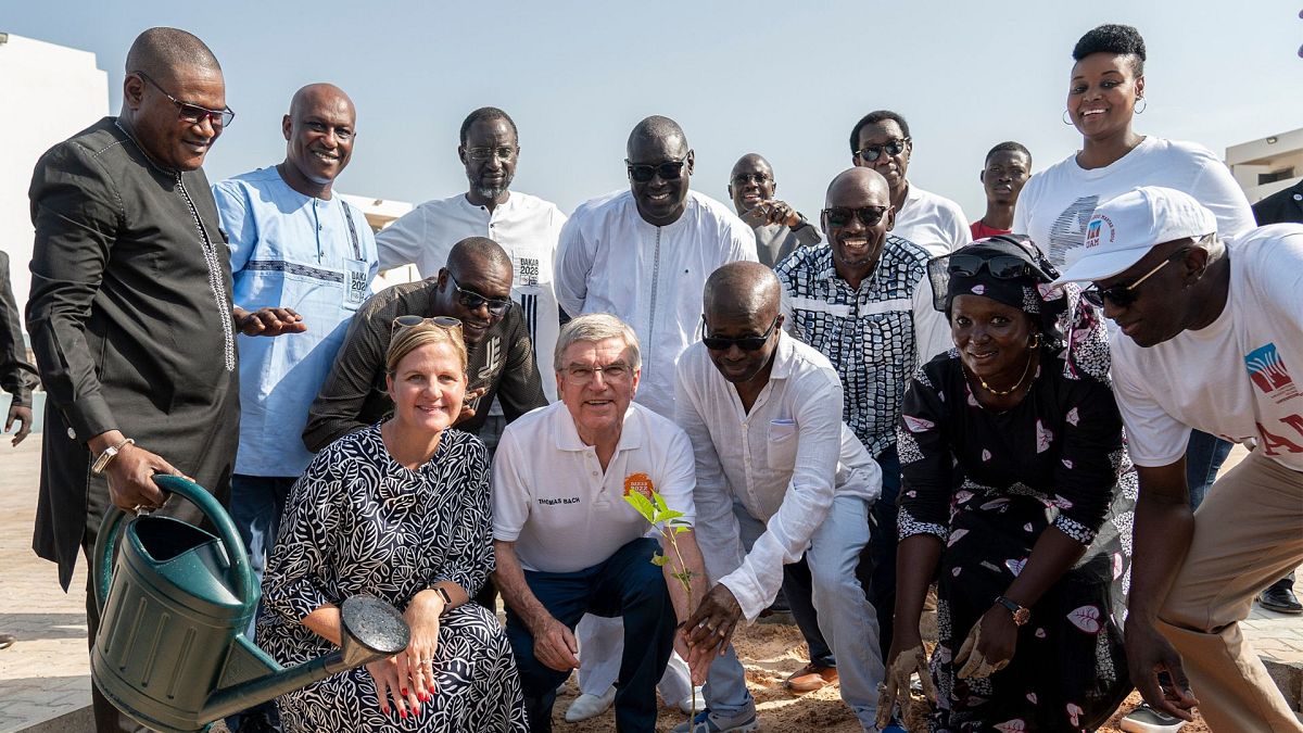 International Olympic Committee (IOC) President Thomas Bach, accompanied by IOC members Kirsty Coventry and Mamadou Diagna Ndiaye, planting native tree 