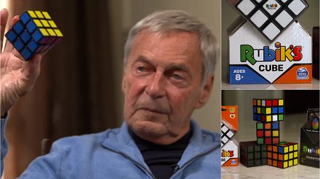 Rubik's Cube Inventor Erno Rubik is posing with his famous toy.