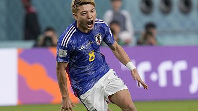 Japan's Ritsu Doan celebrates scoring his side's first goal against Spain during a World Cup group E football match. Thursday, 1 December 2022.