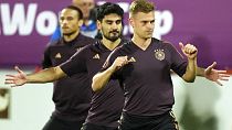 Germany's Joshua Kimmich, foreground, Ilkay Gundogan and Leroy sane warm up during a training session at the Al-Shamal stadium.