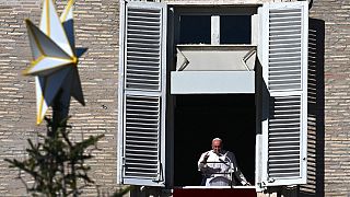 Pope Francis delivers a speech from the window of the apostolic palace overlooking St. Peter's Square during his Angelus prayer on November 27, 2022.