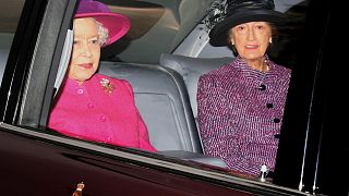 Britain's Queen Elizabeth II, left, and her then lady in waiting, Lady Susan Hussey arriving at St Mary Magdalene Church