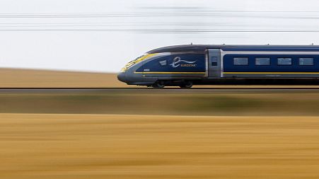 A high-speed Eurostar train speeds on the LGV Nord rail track outside Rully near Paris, France.
