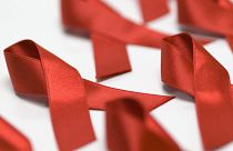 The red ribbon is worn on 1 December every year to raise awareness for World AIDS Day