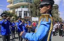 A police marching band plays at a street carnival organized by the Tigray Development Association in support of the recent peace deal agreed between the Ethiopian federal gove