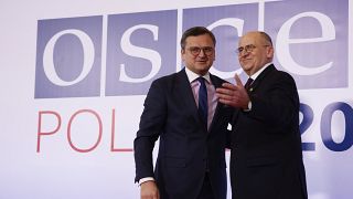 Polish Minister of Foreign Affairs Zbigniew Rau, welcomes his Ukrainian counterpart Dmytro Kuleba, during an OSCE meeting