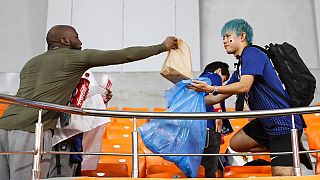Japanese fans are collecting rubbish after games at FIFA World Cup in Qatar.