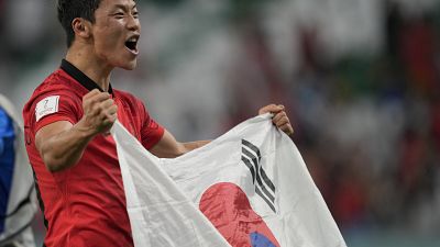 South Korea's Hwang Hee-chan celebrates after his team's 2-1 victory over Portugal.