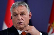 Hungary's Prime Minister Viktor Orban listens to a question during a press conference with Serbian President Aleksandar Vucic and Austria's Chancellor Karl Nehammer.