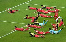 South Korea's team players celebrate after the World Cup group H match aginst Portugal
