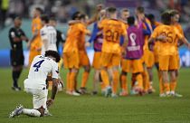 Tyler Adams of the United States knees down on the pitch at the end of the World Cup round of 16 match agains the Netherlands in Doha, 3 December 2022