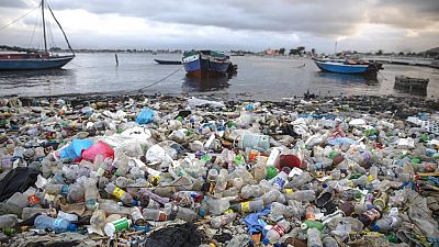 Litter and debris blanket the shoreline in Cap-Haitien, Haiti, March 10, 2022. 