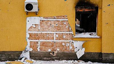 The wall of a damaged building from where a group people tried to steal a work of the famous British artist Banksy in the town of Gostomel, near Kyiv