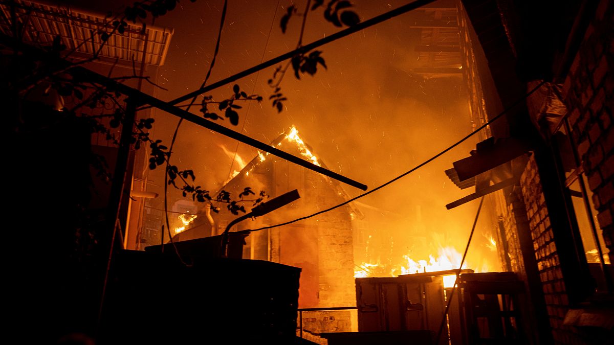 A house burns after a Russian attack in Kherson, Ukraine.