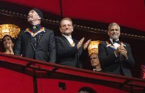 A U2 két tagja és George Clooney a díjazottak között