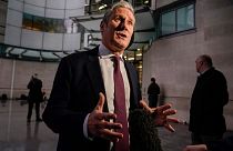 Britain's Labour Party leader Keir Starmer speaks to the media as he leaves the BBC studios, in London, Sunday, Oct. 23, 2022.