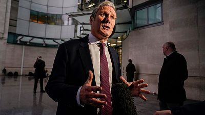Britain's Labour Party leader Keir Starmer speaks to the media as he leaves the BBC studios, in London, Sunday, Oct. 23, 2022.