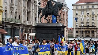 Demonstrators gather on Ukraine's Day of the National Flag on Ban Jelacic Square in central Zagreb.