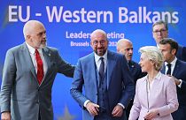 In the foreground, Albanian PM Edi Rama (L), European Council President Charles Michel (C), EU Commission President Ursula von der Leyen (R), in Brussels on June 23, 2022