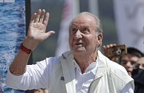 Spain's former King Juan Carlos waves before a reception at a nautical club prior to a yachting event in Sanxenxo, north western Spain, Friday, 20 May 2022.