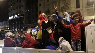 Morocco fans celebrate their team's victory against Spain in the World Cup round of 16 soccer match between Morocco and Spain, in Casablanca, Morocco, Tuesday 2022