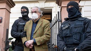Police escorts Prince Heinrich XIII P. R  after 25 suspected members and supporters of a far-right group were detained during raids across Germany.
