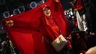 Morocco fans in Marseille, southern France, celebrate after victory over Spain in the Qatar World Cup.
