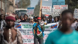 Goma residents join in a protest called by the civil society against the United Nations peacekeeping force and fighting factions, Goma, Dec. 1, 2022.