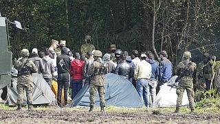 Polish security forces block migrants stuck on the border with Belarus in Usnarz Gorny, Poland