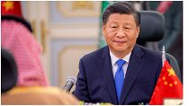 الرئيس الصيني متحدثا إلى ولي العهد السعودي