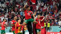 احتفال لاعبي المغرب بالفوز على البرتغال
