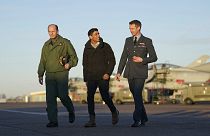 Air Chief Marshal Mike Wigston, left and Station Commander for RAF Coningsby Billy Cooper walk with UK PM Rishi Sunak during his visit to RAF Coningsby. Friday, 9 Dec. 2022.
