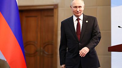 Russian President Vladimir Putin arrives at his news conference after the Summit of the Intergovernmental Council of the Eurasian Economic Union in Bishkek, Kyrgyzstan.