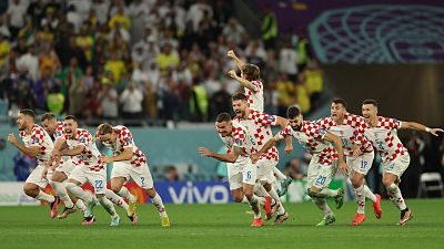 Les joueurs croates après leur qualification en demi-finale à l'issue des tirs au but contre le Brésil, le 9 décembre 2022 à Doha