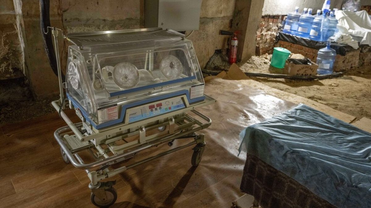 An incubator part of a makeshift operating area for urgent deliveries, inside the bomb shelter of the Lviv state regional perinatal centre, western Ukraine