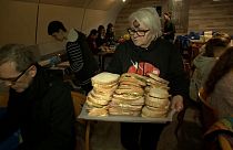 The Budapest Bike Maffia prepared and served more than 2,000 sandwiches for the needy