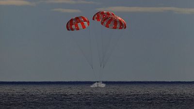 the Orion spacecraft for the Artemis I mission splashes down in the Pacific Ocean after a 25.5 day mission to the Moon, Sunday, Dec. 11, 2022