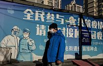 في أحد شوارع بكين، الصين- 11 ديسمبر 2022.