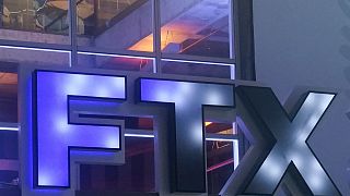 The FTX Arena logo is seen where the Miami Heat basketball team plays on Nov. 12, 2022, in Miami. The former CEO of failed crypto firm FTX Sam Bankman-Fried has been arrested.