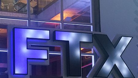 The FTX Arena logo is seen where the Miami Heat basketball team plays on Nov. 12, 2022, in Miami. The former CEO of failed crypto firm FTX Sam Bankman-Fried has been arrested.
