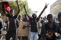 Sudanese demonstrators against military rule march in Khartoum, Sudan, Tuesday, Dec. 13, 2022