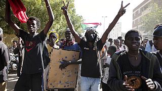 Sudanese demonstrators against military rule march in Khartoum, Sudan, Tuesday, Dec. 13, 2022