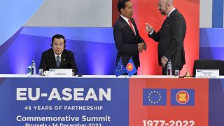 European Council President Charles Michel, right, speaks with Indonesia's President Joko Widodo, centre, during the opening ceremony at an EU-ASEAN summit in Brussels.