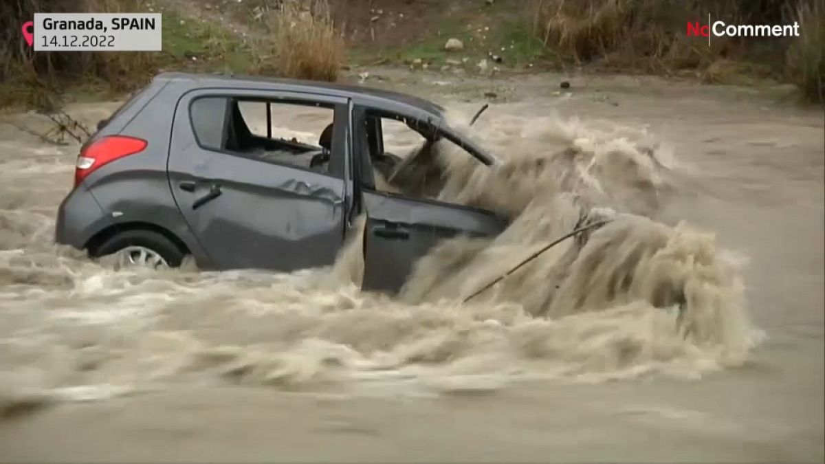 Many were stranded after a storm battered central Spain